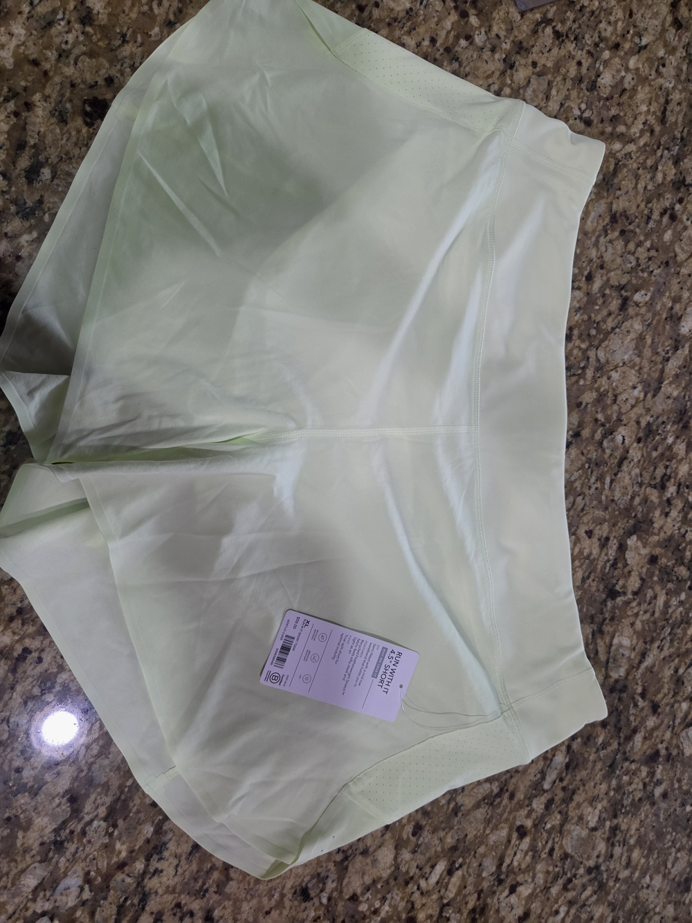 Athleta Women's Run With It 4.5" High-Rise Athletic Shorts in Pale Green